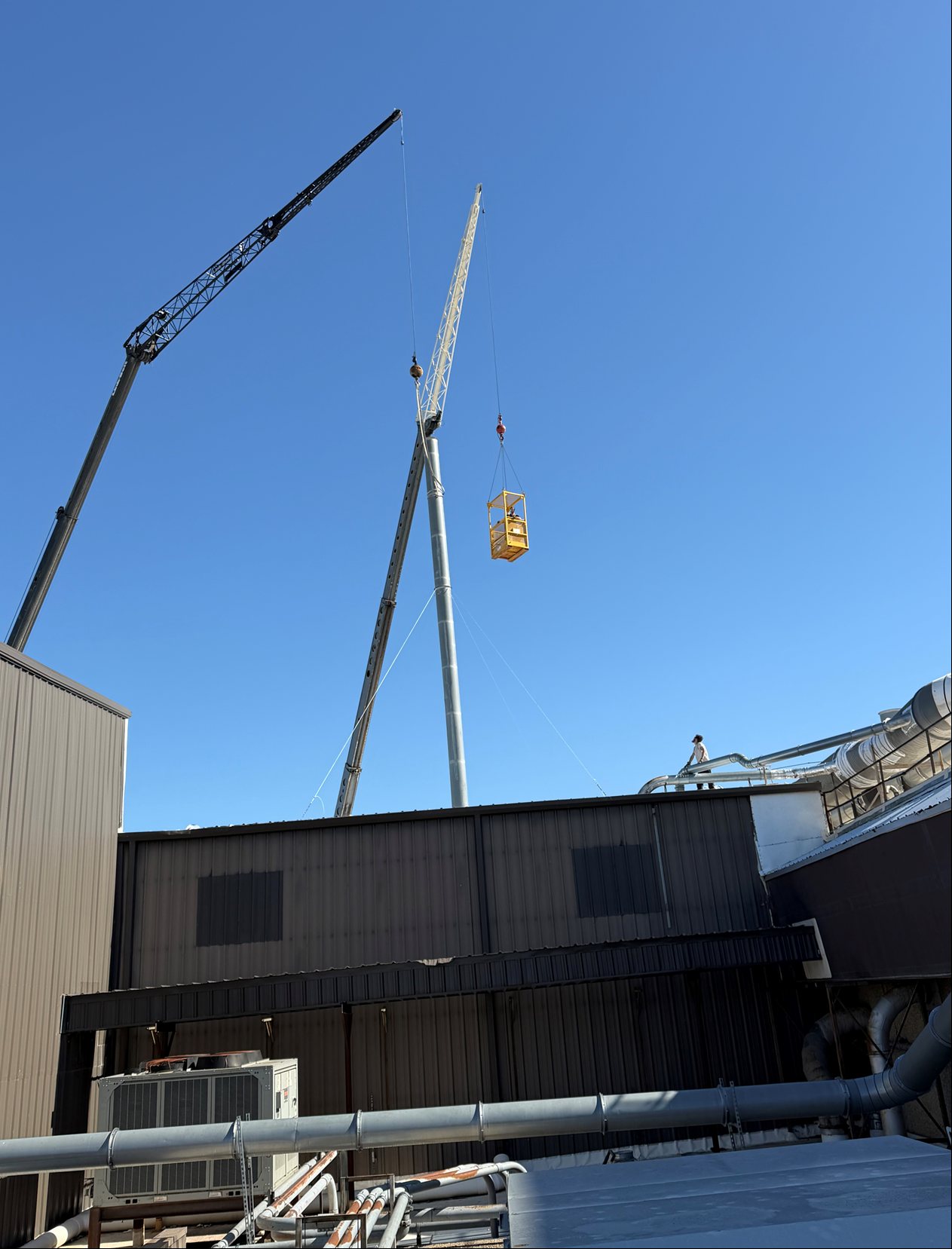 Crane-supported industrial installation at a manufacturing facility